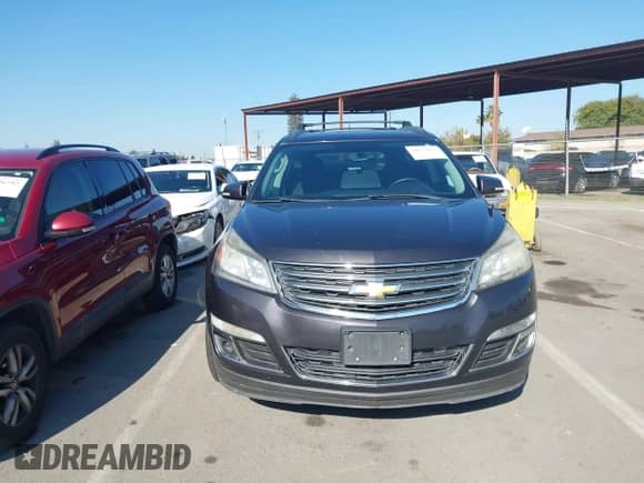 2015 Chevrolet Traverse LT z VIN 1GNKRHKD8FJ168217, wystawiony jako IAAI lot #43575623 z przebiegiem 215 964 mil mil oraz . Historia ofert i sprzedaży dostępna na DreamBid. Obrazek 12.