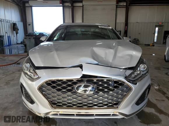2019 Hyundai Sonata Sport с VIN 5NPE34AF3KH820649, выставлен на аукционе Copart как лот 82548585 с пробегом 96 306 миль миль и Списание • Salvage title. История ставок и продаж доступна на DreamBid. Изображение 5.
