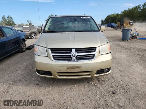 2010 Dodge Grand Caravan SXT with VIN 2D4RN5DX3AR252431, listed as a Copart auction lot 71743845 with 143,958 mi miles and Salvage title. Bid and sale history available at DreamBid. Image 5.