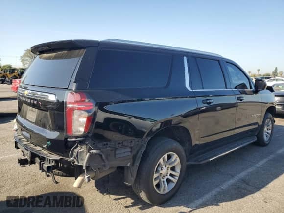 2022 Chevrolet Suburban LT с VIN 1GNSCCKT1NR305591, выставлен на аукционе Copart как лот 49726425 с пробегом 121 364 миль миль и Списание • Salvage title. История ставок и продаж доступна на DreamBid. Изображение 3.