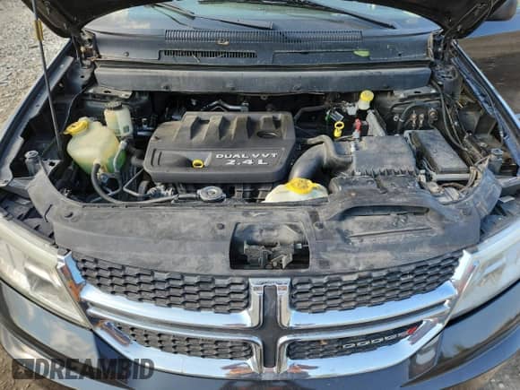 2012 Dodge Journey American Value с VIN 3C4PDCAB9CT280125, выставлен на аукционе Copart как лот 69024135 с пробегом 180 473 миль миль и На запчасти • Non repairable. История ставок и продаж доступна на DreamBid. Изображение 12.