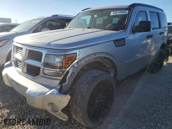 2008 Dodge Nitro SLT with VIN 1D8GT58K48W235584, listed as a Copart auction lot 84613424 with 219,494 mi miles and Salvage title. Bid and sale history available at DreamBid. Image 1.