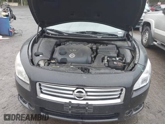 2014 Nissan Maxima S z VIN 1N4AA5AP9EC905908, wystawiony jako IAAI lot #43253021 z przebiegiem 118 012 mil mil oraz . Historia ofert i sprzedaży dostępna na DreamBid. Obrazek 10.