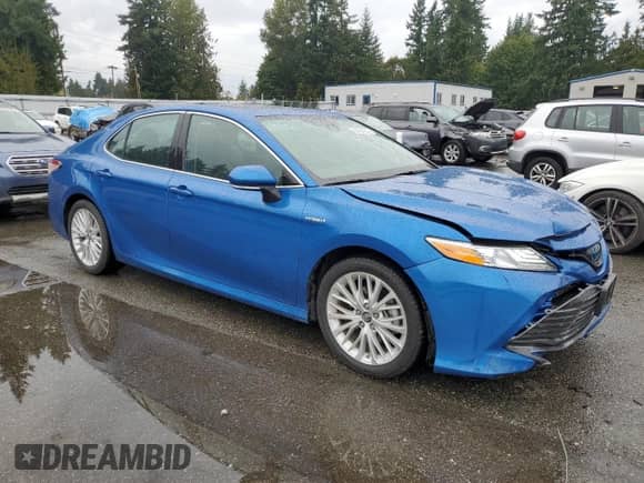 2019 Toyota Camry Hybrid LE с VIN 4T1B21HK9KU010337, выставлен на аукционе Copart как лот 84294555 с пробегом 35 132 миль миль и Списание • Salvage title. История ставок и продаж доступна на DreamBid. Изображение 4.