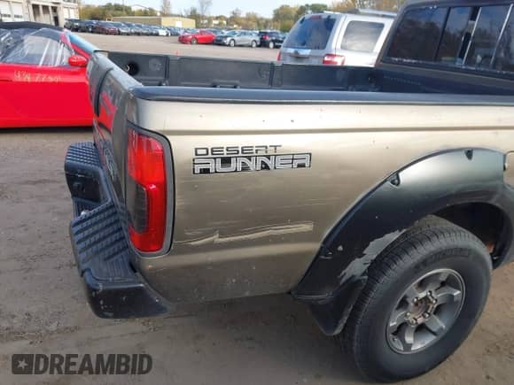 2001 Nissan Frontier SE Desert Runner with VIN 1N6ED26T21C344174, listed as a IAAI auction lot 43496361 with 260,015 mi miles and . Bid and sale history available at DreamBid. Image 6.