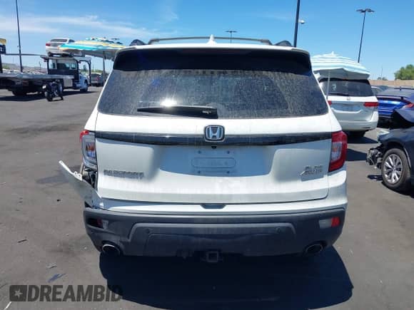 2019 Honda Passport Elite with VIN 5FNYF8H05KB009575, listed as a IAAI auction lot 42804678 with 70,468 mi miles and . Bid and sale history available at DreamBid. Image 17.