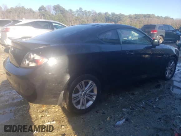 2008 Hyundai Tiburon GS with VIN KMHHM66D08U292138, listed as a Copart auction lot 83320704 with 277,189 mi miles and Salvage title. Bid and sale history available at DreamBid. Image 3.