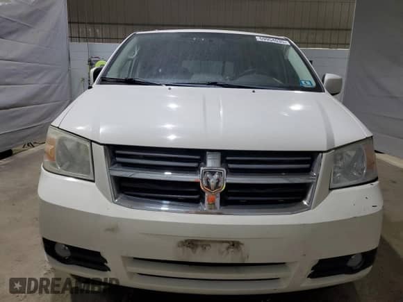 2010 Dodge Grand Caravan SXT z VIN 2D4RN5D17AR499253, wystawiony jako Copart lot #69954035 z przebiegiem 153 984 mil mil oraz Szkoda całkowita • Salvage title. Historia ofert i sprzedaży dostępna na DreamBid. Obrazek 5.