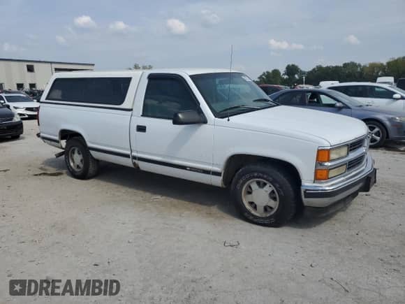 1997 Chevrolet Silverado 1500 with VIN 1GCEC14RXVZ124680, listed as a Copart auction lot 80872365 with 158,021 mi miles and Salvage title. Bid and sale history available at DreamBid. Image 4.