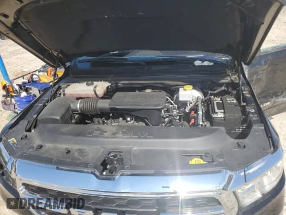 2022 Ram 1500 Big Horn с VIN 1C6RREFG2NN325703, выставлен на аукционе Copart как лот 70269345 с пробегом Не указан миль и Списание • Salvage title. История ставок и продаж доступна на DreamBid. Изображение 11.