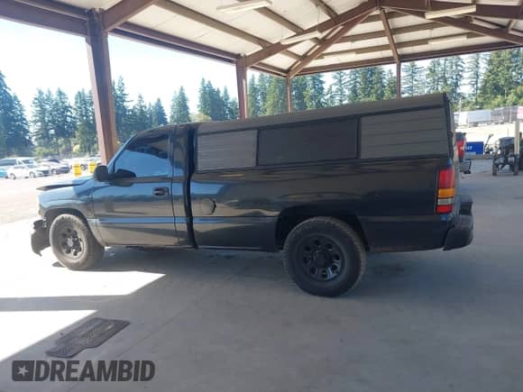 2005 GMC Sierra 1500 Work Truck z VIN 1GTEC14X75Z329663, wystawiony jako IAAI lot #42872806 z przebiegiem 182 385 mil mil oraz . Historia ofert i sprzedaży dostępna na DreamBid. Obrazek 15.