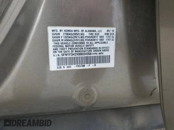 2011 Honda Pilot LX z VIN 5FNYF3H2XBB024268, wystawiony jako Copart lot #81864065 z przebiegiem 243 782 mil mil oraz Czysty tytuł • Clean title. Historia ofert i sprzedaży dostępna na DreamBid. Obrazek 13.