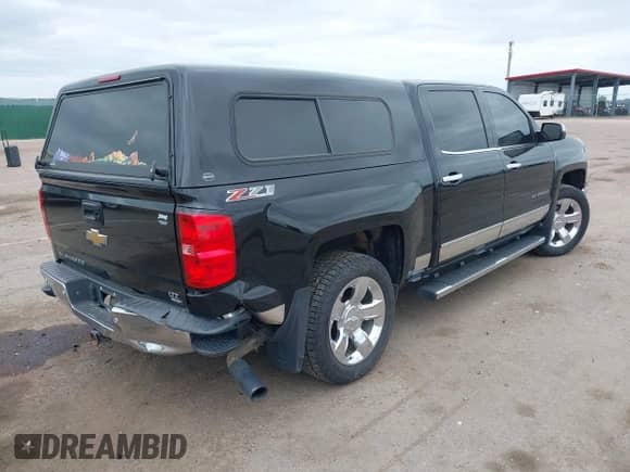 2014 Chevrolet Silverado 1500 LTZ with VIN 3GCUKSEC5EG301747, listed as a IAAI auction lot 42445832 with 169,483 mi miles and . Bid and sale history available at DreamBid. Image 4.