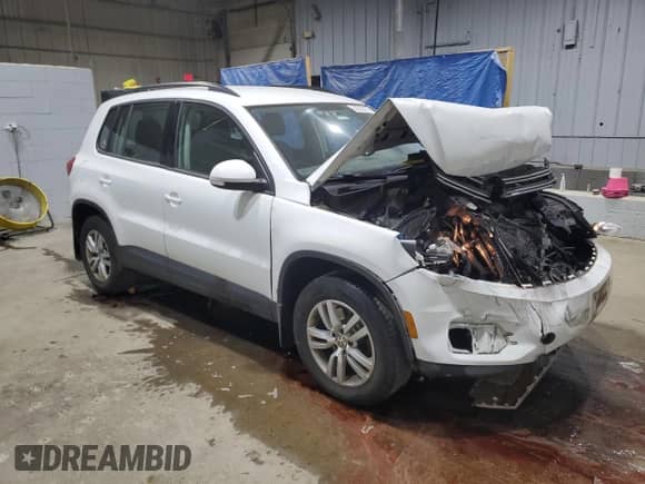 2015 Volkswagen Tiguan SEL with VIN WVGBV7AX5FW582595, listed as a Copart auction lot 68523275 with 128,991 mi miles and Salvage title. Bid and sale history available at DreamBid. Image 4.