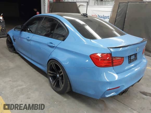 2015 BMW M3 with VIN WBS3C9C5XFP803102, listed as a IAAI auction lot 41616127 with 44,538 mi miles and . Bid and sale history available at DreamBid. Image 3.