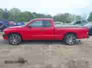 1999 Dodge Dakota SLT z VIN 1B7GL22X2XS129464, wystawiony jako IAAI lot #41975506 z przebiegiem 99 437 mil mil oraz . Historia ofert i sprzedaży dostępna na DreamBid. Obrazek 14.