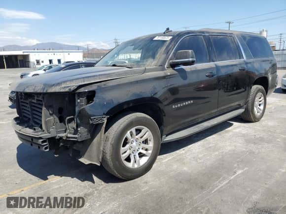 2017 Chevrolet Suburban LS with VIN 1GNSCGEC3HR311108, listed as a Copart auction lot 70158525 with 228,308 mi miles and Salvage title. Bid and sale history available at DreamBid. Image 1.