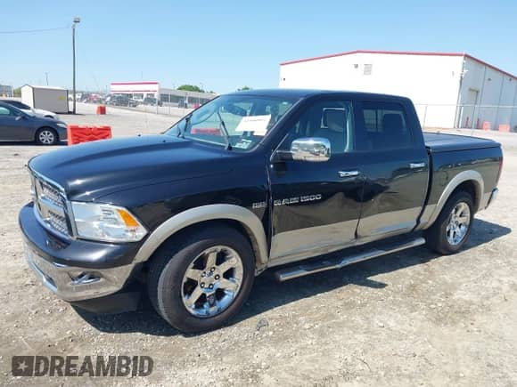 2011 Ram 1500 SLT z VIN 1D7RB1CT9BS628262, wystawiony jako IAAI lot #41980904 z przebiegiem 195 466 mil mil oraz . Historia ofert i sprzedaży dostępna na DreamBid. Obrazek 6.