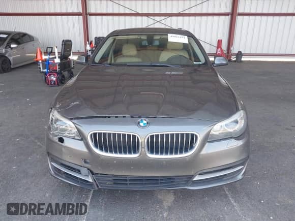 2014 BMW 5 Series 528i z VIN WBA5A5C5XED501501, wystawiony jako IAAI lot #43063194 z przebiegiem 145 415 mil mil oraz . Historia ofert i sprzedaży dostępna na DreamBid. Obrazek 12.