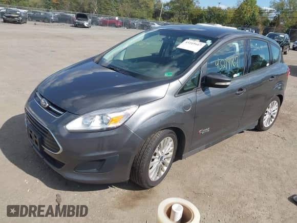 2017 Ford C-Max SE z VIN 1FADP5EU4HL113018, wystawiony jako IAAI lot #43219167 z przebiegiem 129 977 mil mil oraz . Historia ofert i sprzedaży dostępna na DreamBid. Obrazek 17.
