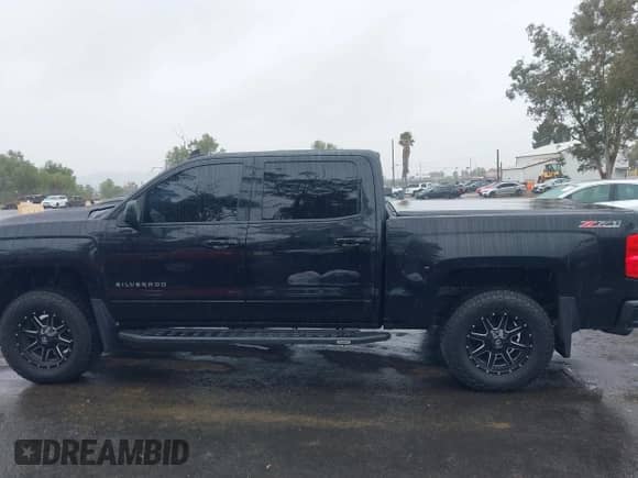 2016 Chevrolet Silverado 1500 LT with VIN 3GCUKREC2GG123095, listed as a IAAI auction lot 41552070 with 87,841 mi miles and . Bid and sale history available at DreamBid. Image 14.