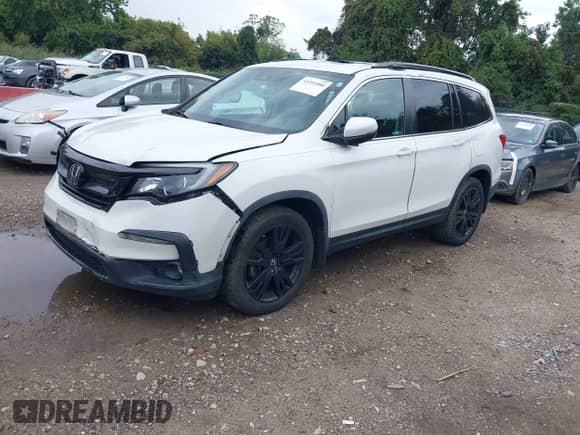 2021 Honda Pilot Special Edition with VIN 5FNYF6H22MB034734, listed as a IAAI auction lot 43291080 with 162,677 mi miles and . Bid and sale history available at DreamBid. Image 21.