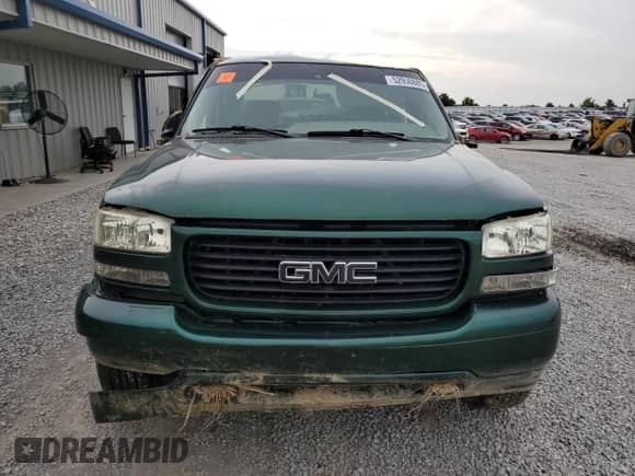 2001 GMC Sierra 1500 SLE z VIN 2GTEC19V411310370, wystawiony jako Copart lot #52950885 z przebiegiem 240 629 mil mil oraz Szkoda całkowita • Salvage title. Historia ofert i sprzedaży dostępna na DreamBid. Obrazek 5.