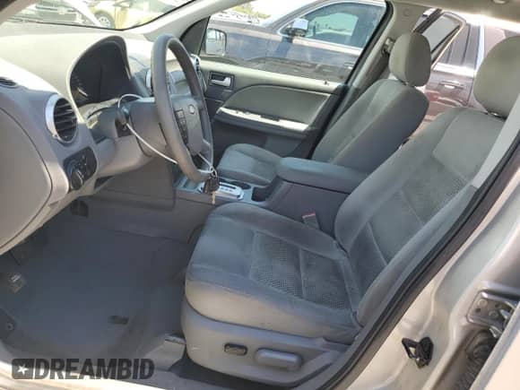 2006 Ford Freestyle SE с VIN 1FMZK01136GA36883, выставлен на аукционе Copart как лот 56223985 с пробегом 156 885 миль миль и Списание • Salvage title. История ставок и продаж доступна на DreamBid. Изображение 7.