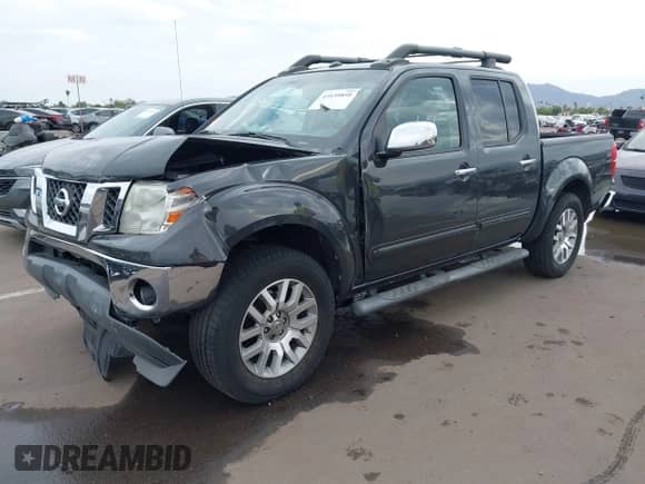 2012 Nissan Frontier SV with VIN 1N6AD0ER0CC437609, listed as a IAAI auction lot 43439850 with 165,136 mi miles and . Bid and sale history available at DreamBid. Image 2.