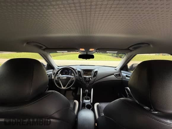 2014 Hyundai Veloster Turbo R-Spec с VIN KMHTC6AE1EU182840, выставлен на аукционе Copart как лот 80849145 с пробегом 56 852 миль миль и Чистый • Clean title. История ставок и продаж доступна на DreamBid. Изображение 9.