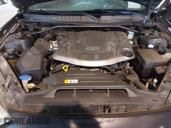 2015 Hyundai Genesis Coupe 3.8L Base z VIN KMHHU6KJ7FU123694, wystawiony jako IAAI lot #43363415 z przebiegiem 95 787 mil mil oraz . Historia ofert i sprzedaży dostępna na DreamBid. Obrazek 10.