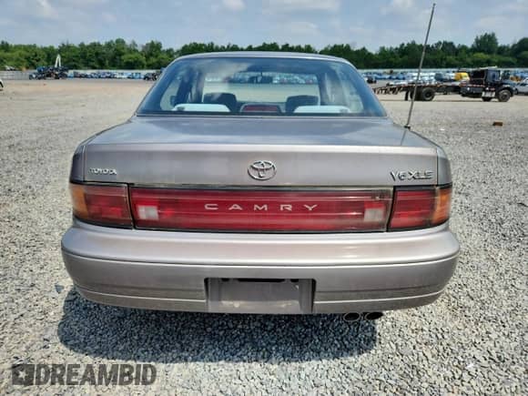 1993 Toyota Camry с VIN 4T1VK13E1PU075530, выставлен на аукционе Copart как лот 64218835 с пробегом 58 871 миль миль и Списание • Salvage title. История ставок и продаж доступна на DreamBid. Изображение 6.