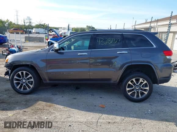 2017 Jeep Grand Cherokee Overland with VIN 1C4RJFCG4HC729662, listed as a IAAI auction lot 43282727 with 138,876 mi miles and . Bid and sale history available at DreamBid. Image 14.