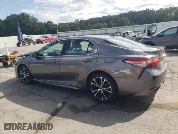 2019 Toyota Camry Hybrid SE с VIN 4T1B21HK2KU521372, выставлен на аукционе Copart как лот 85365895 с пробегом 79 115 миль миль и Списание • Salvage title. История ставок и продаж доступна на DreamBid. Изображение 2.
