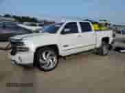 2018 Chevrolet Silverado 1500 High Country with VIN 3GCPCTEJ1JG236761, listed as a Copart auction lot 82572874 with 101,377 mi miles and Salvage title. Bid and sale history available at DreamBid. Image 1.