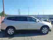 2014 Chevrolet Traverse LT z VIN 1GNKRHKD3EJ109929, wystawiony jako IAAI lot #42515411 z przebiegiem Nie podano mil oraz . Historia ofert i sprzedaży dostępna na DreamBid. Obrazek 13.