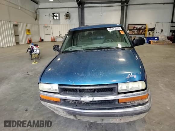 2000 Chevrolet S-10 LS z VIN 1GCCS19W1Y8257556, wystawiony jako Copart lot #64743085 z przebiegiem 284 985 mil mil oraz Szkoda całkowita • Salvage title. Historia ofert i sprzedaży dostępna na DreamBid. Obrazek 13.