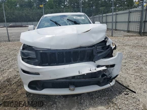2014 Jeep Grand Cherokee SRT-8 z VIN 1C4RJFDJ2EC242210, wystawiony jako Copart lot #60677855 z przebiegiem 68 050 mil mil oraz Szkoda całkowita • Salvage title. Historia ofert i sprzedaży dostępna na DreamBid. Obrazek 5.