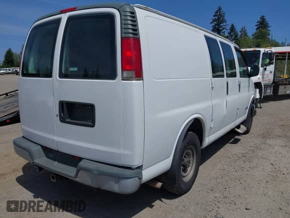 1997 Chevrolet Chevy Van z VIN 1GCHG35J0V1094111, wystawiony jako IAAI lot #42496560 z przebiegiem 164 894 mil mil oraz . Historia ofert i sprzedaży dostępna na DreamBid. Obrazek 4.