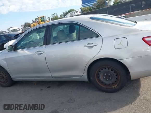 2007 Toyota Camry LE with VIN 4T1BK46K07U544399, listed as a IAAI auction lot 43422877 with 151,734 mi miles and . Bid and sale history available at DreamBid. Image 14.