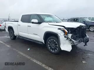 2023 Toyota Tundra Limited Hybrid with VIN 5TFJC5EC9PX003766, listed as a IAAI auction lot 41254436 with 22,590 mi miles and . Bid and sale history available at DreamBid. Image 1.