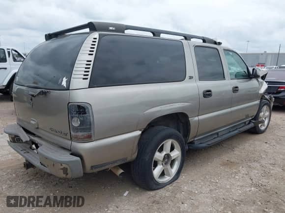 2002 Chevrolet Suburban Z71 z VIN 3GNFK16Z12G302970, wystawiony jako IAAI lot #41961193 z przebiegiem 245 497 mil mil oraz . Historia ofert i sprzedaży dostępna na DreamBid. Obrazek 4.