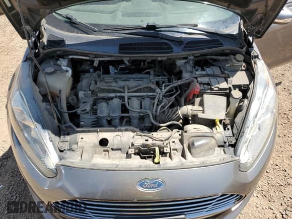 2014 Ford Fiesta SE с VIN 3FADP4BJ4EM190311, выставлен на аукционе Copart как лот 68228075 с пробегом 71 212 миль миль и Списание • Salvage title. История ставок и продаж доступна на DreamBid. Изображение 11.