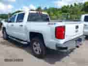 2014 Chevrolet Silverado 1500 LT z VIN 3GCUKREC6EG165041, wystawiony jako IAAI lot #42588499 z przebiegiem 189 554 mil mil oraz . Historia ofert i sprzedaży dostępna na DreamBid. Obrazek 3.