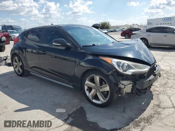 2013 Hyundai Veloster Turbo с VIN KMHTC6AE5DU144381, выставлен на аукционе Copart как лот 81855345 с пробегом 172 238 миль миль и Списание • Salvage title. История ставок и продаж доступна на DreamBid. Изображение 4.