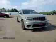 2020 Jeep Grand Cherokee SRT with VIN 1C4RJFDJ8LC158048, listed as a Copart auction lot 57426205 with 52,979 mi miles and Salvage title. Bid and sale history available at DreamBid. Image 13.