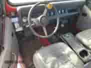 1989 Jeep Wrangler with VIN 2J4FY29E5KJ135604, listed as a Copart auction lot 61552705 with 136,290 mi miles and Clean title. Bid and sale history available at DreamBid. Image 8.