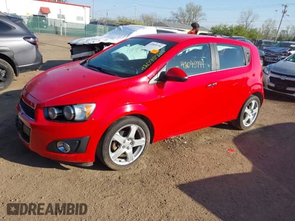 2015 Chevrolet Sonic LTZ with VIN 1G1JE6SB1F4143993, listed as a IAAI auction lot 42095794 with 163,363 mi miles and . Bid and sale history available at DreamBid. Image 17.