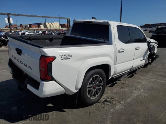 2024 Toyota Tacoma SR5 with VIN 3TMLB5JN1RM062810, listed as a Copart auction lot 80575815 with 11,680 mi miles and Salvage title. Bid and sale history available at DreamBid. Image 3.