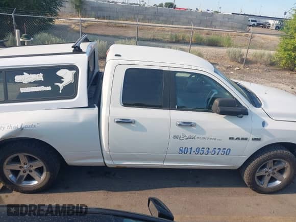 2009 Dodge 1500 SLT with VIN 1D3HV18T79S731610, listed as a IAAI auction lot 42809559 with 305,781 mi miles and . Bid and sale history available at DreamBid. Image 14.